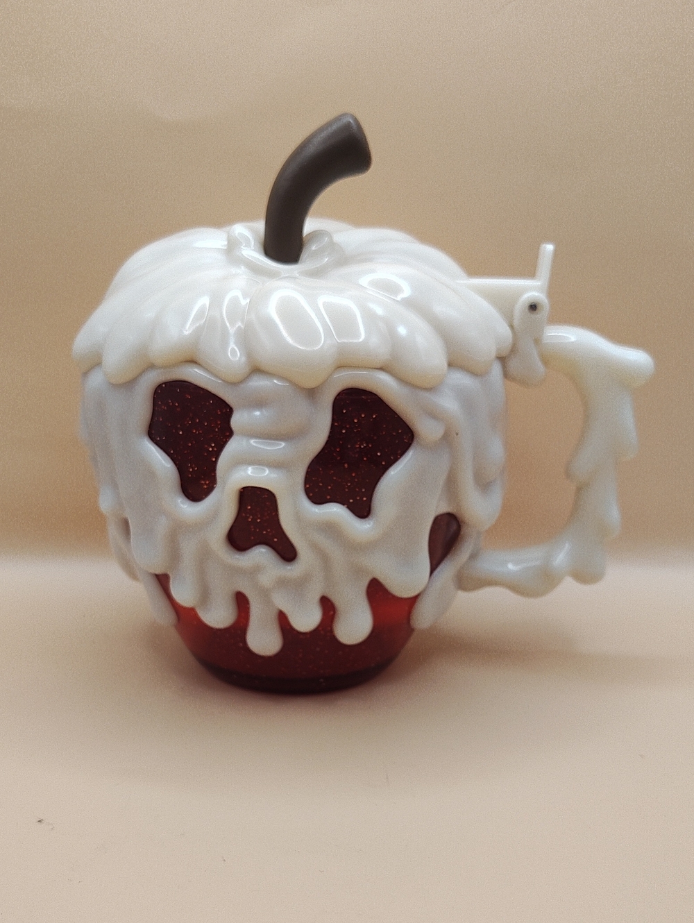 Disney Parks Poison Apple Stein, a collectible souvenir cup inspired Snow White